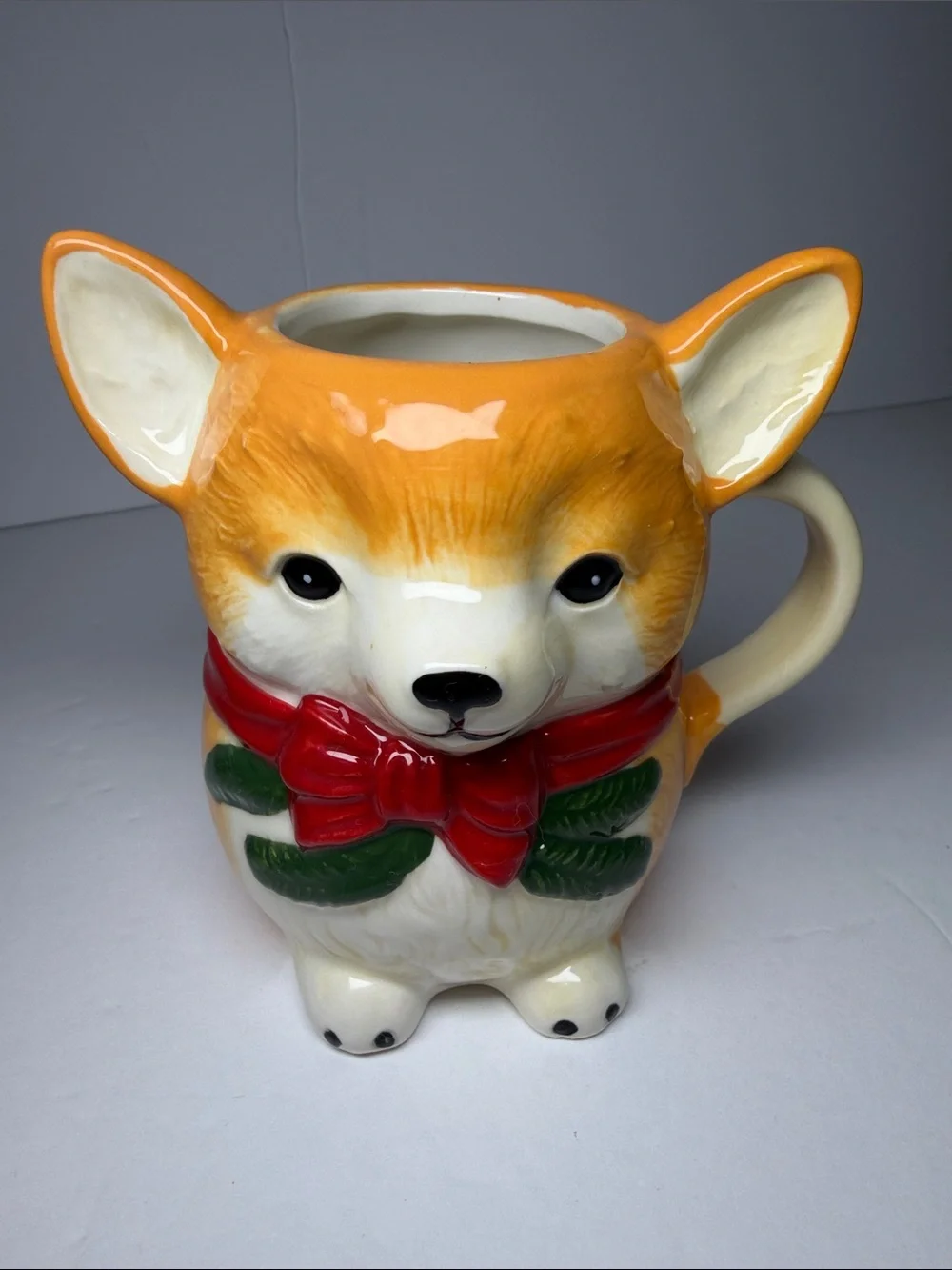Anthropologie Peluche Pet Stoneware Mug in the Corgi motif.